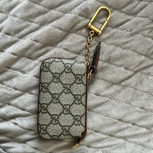 Gucci wallet with a keychain. Lightly used.